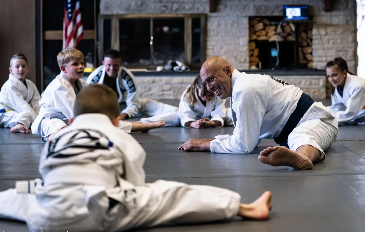 Royce Gracie leading a kids Brazilian Jiu Jitsu class and self-defense instruction