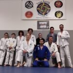 Students and instructors posing after Brazilian Jiu Jitsu training at Royce Gracie Academy Mount Pleasant SC